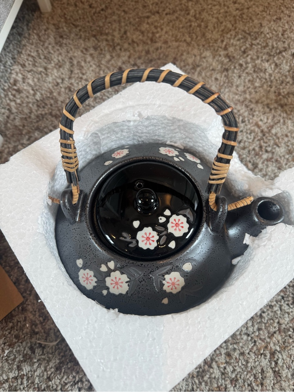 Nikko Ceramics Black Floral Cast Iron Teapot with Woven Handle